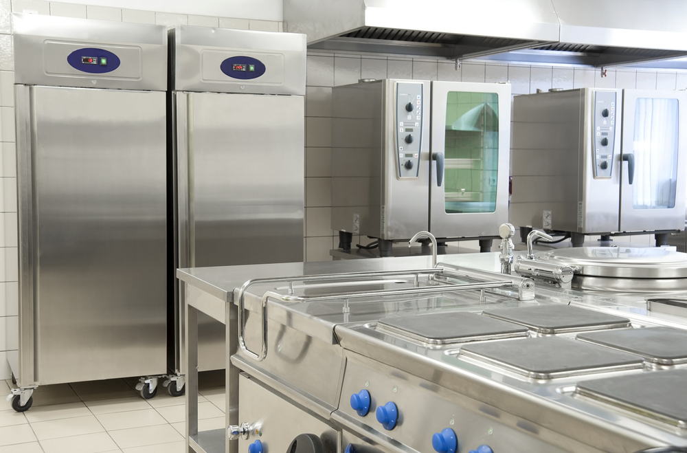 stainless steel kitchen area with fridges